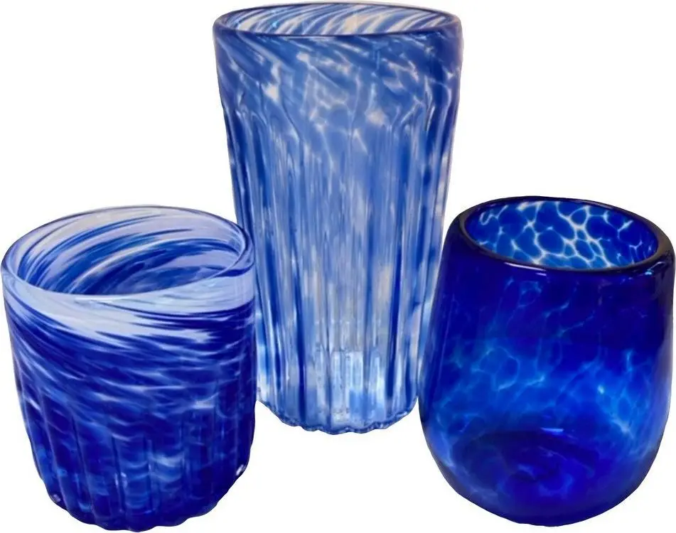 Three hand-blown drinking glasses in swirled cobalt blue