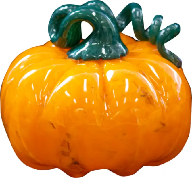 Orange glass pumpkin with a curling green stem